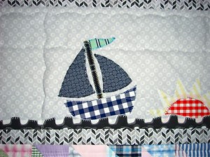 Sail boats happily sailing on a sea of organic cotton by Daisy Janie.