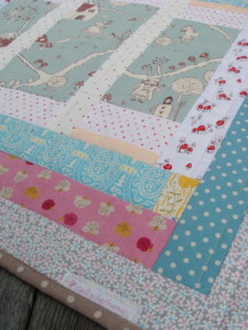 Alice In Wonderland Baby Quilt for sale.