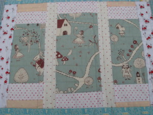 Alice In Wonderland Baby Quilt for sale.