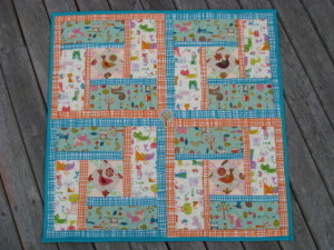 Modern Baby Quilt by SalsySafrano Quilts.