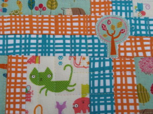 Modern Baby Quilt by SalsySafrano Quilts.