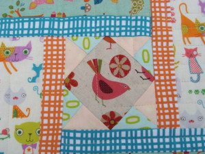 Modern Baby Quilt by SalsySafrano Quilts.